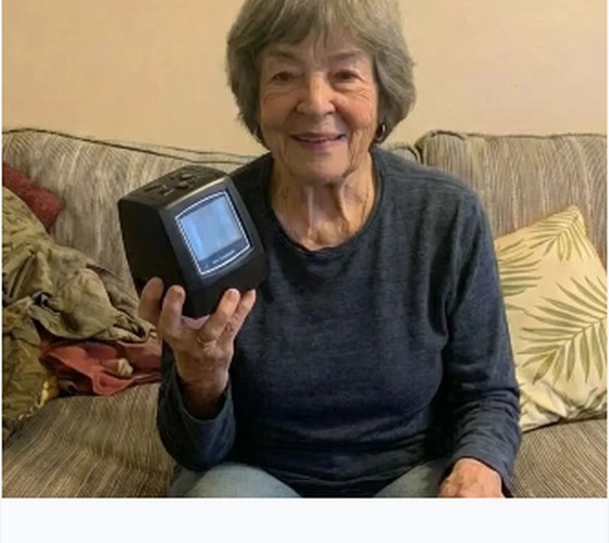 Margaret holding MemoryVault Box